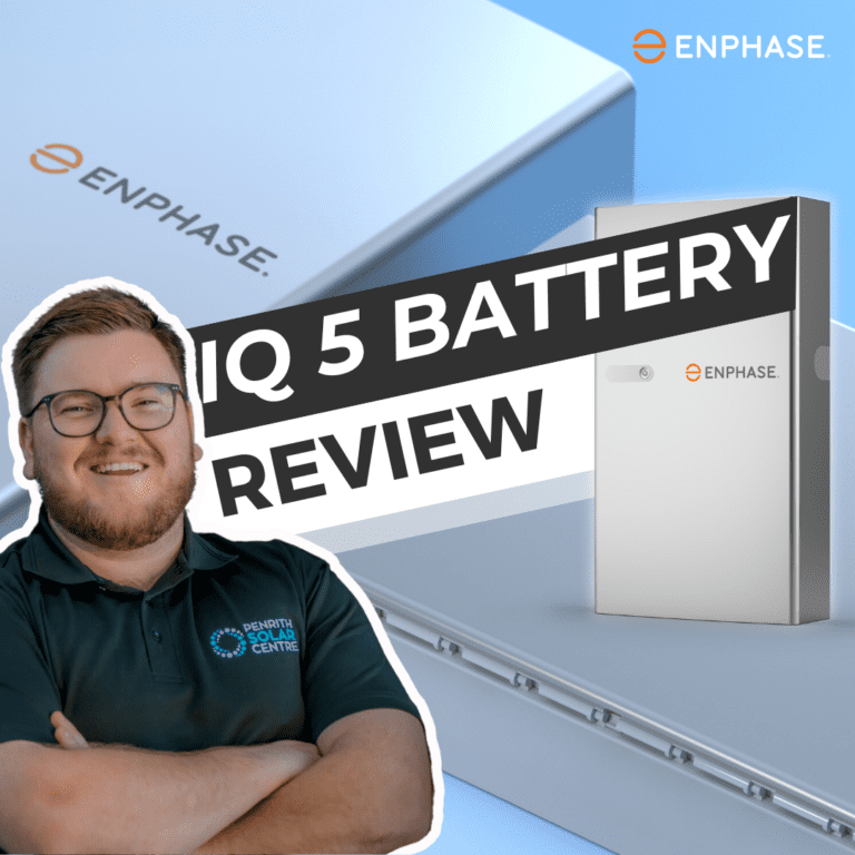 A man standing in front of a box with the words qi 5 battery review.