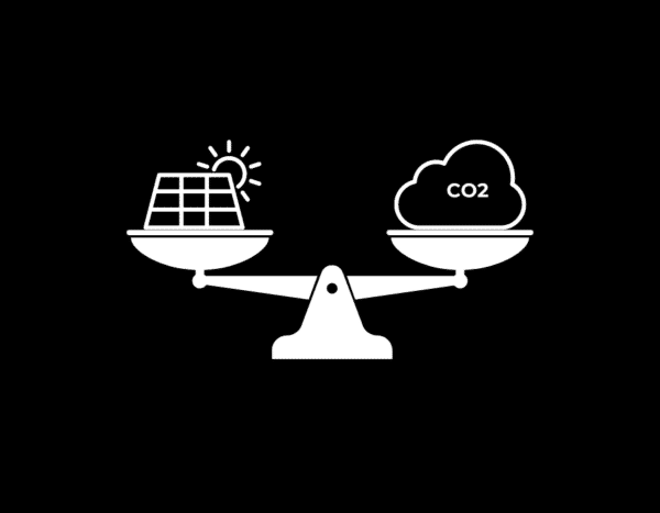 Graphic of a balance scale with a solar panel and sun icon on the left side and a cloud labeled "co2" on the right side, against a black background.