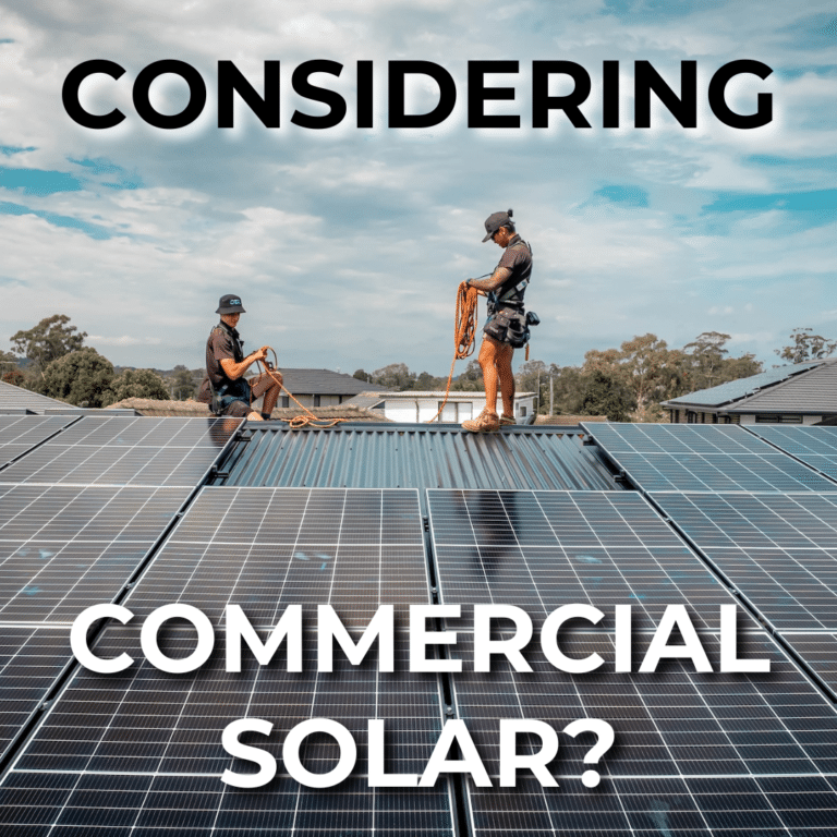 Two workers installing solar panels on a commercial building roof with the text "CONSIDERING COMMERCIAL SOLAR?" displayed.