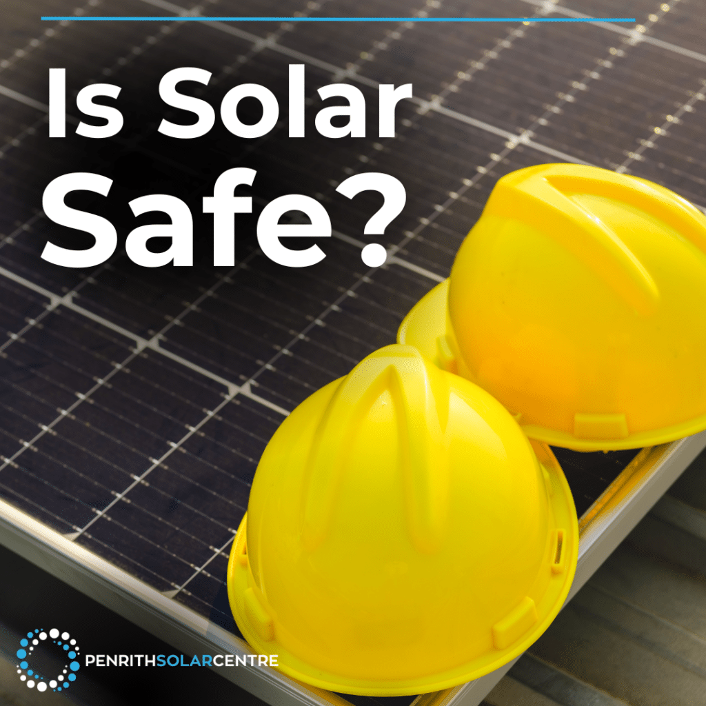 Two yellow safety helmets on a solar panel with the text "is solar safe?" and the logo of penrith solar centre.