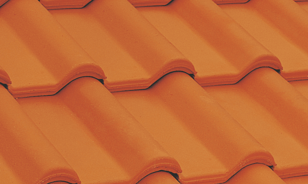 A close up image of a Swiss Terracotta tiled roof.
